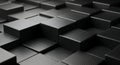 Carbon fiber textured cubes forming abstract geometric pattern with dramatic lighting Royalty Free Stock Photo