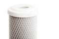Carbon filter for water purification with a mesh structure of fishing line. Royalty Free Stock Photo