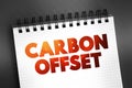 Carbon offset - reduction of emissions of carbon dioxide made in order to compensate for emissions made elsewhere, text concept on Royalty Free Stock Photo