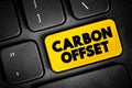 Carbon offset - reduction of emissions of carbon dioxide made in order to compensate for emissions made elsewhere, text button on