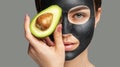 Carbon peeling procedure to beautiful blue-eyed girl in a beauty salon. Girl with avocado.Hardware cosmetology treatment