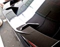 the carbon pressure wing of the car helps load the rear axle of the Royalty Free Stock Photo