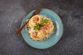 Carbonara pasta, spaghetti with bacon, egg, hard parmesan cheese and cream sauce. Royalty Free Stock Photo