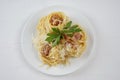 Carbonara pasta, spaghetti with bacon, egg, hard parmesan cheese and cream sauce. Royalty Free Stock Photo