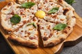 Carbonara pizza with bacon and eggs