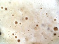 Carbonated drink foam close up with small bubbles texture Royalty Free Stock Photo