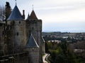 The Wall Surrounding Carcassonne With Windows and a Path