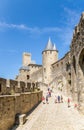 Carcassonne, France. Tourists visiting exotic medieval fortifications