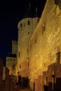 Carcassonne medieval fortress night view, old walls and towers h Royalty Free Stock Photo