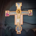 Modern wooden crucifix hanging in the central nave of the Abbey