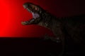 Carcharodontosaurus with spot light on the head and red light Royalty Free Stock Photo