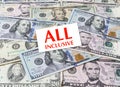 Card All inclusive on dollars background Royalty Free Stock Photo