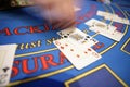 Card deler blured hand casino