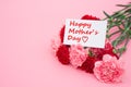 Card of happy mother's day and prensent box and red carnations