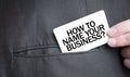 Card with HOW TO NAME YOUR BUISINESS text in pocket of businessman suit. Investment and decisions business concept