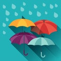 Card with multicolor umbrellas in flat design