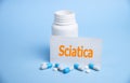 a card with the name of the diagnosis - sciatica. Selective focus. Medical concept Royalty Free Stock Photo