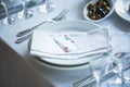 Card with a name on the festive wedding table. Royalty Free Stock Photo