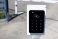 Card reader at the entrance to the parking area against the background of the barrier Royalty Free Stock Photo