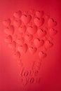 Card of red hearts, cut out of paper, laid out in the form of a balloon. Royalty Free Stock Photo