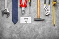 Card with text Happy Father's Day, tie and set of tools on grey background Royalty Free Stock Photo