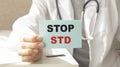 Card with text STOP STD medical concept