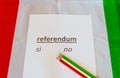 The card to cast their vote on a referendum held in Italy