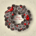 Card with wreath of fir cones and redbirds Royalty Free Stock Photo