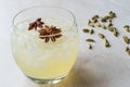 Cardamom Cocktail with Anise Star and Crushed Ice. Royalty Free Stock Photo