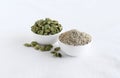 Cardamom Powder and Pods in Bowls Royalty Free Stock Photo