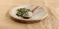 Cardamom Powder on a Wooden Spoon and Cardamom Pods and Seeds Royalty Free Stock Photo
