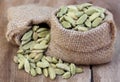 Cardamom seed in sack Royalty Free Stock Photo