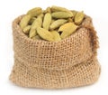 Cardamom seed in sack Royalty Free Stock Photo