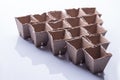 Cardbaord fibre containers arranged in a tringle. Royalty Free Stock Photo
