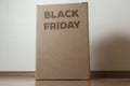 Cardboard box with black friday order written on the box