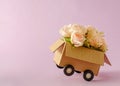 Cardboard box delivery container with truck wheels Royalty Free Stock Photo