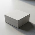Cardboard box with a fitted lid sits on a smooth, light-colored Royalty Free Stock Photo