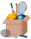 Cardboard box full of sport equipments on white background Royalty Free Stock Photo