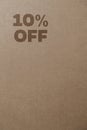 Cardboard box with 10% off order written on the box