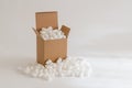 Cardboard box with packing peanuts Royalty Free Stock Photo