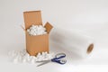 Cardboard box with packing peanuts Royalty Free Stock Photo