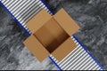 Cardboard box parcel on conveyor belt, production ling automated machine, 3D rendering.