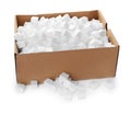 Cardboard box with styrofoam cubes on white background Royalty Free Stock Photo