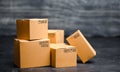 Cardboard boxes. The concept of packing goods, sending orders to customers. Warehouse of finished products and equipment. Moving Royalty Free Stock Photo