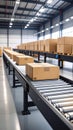 Cardboard boxes moving on a conveyor belt system inside a modern warehouse Royalty Free Stock Photo