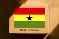 Made in Ghana. Cardboard boxes with text `Made In Ghana` and the Flag of Ghana.