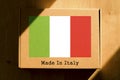 Made in Italy. Cardboard boxes with text `Made In Italy` and the Flag of Italy.