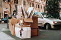 Cardboard boxes are stacked on the street for recycling