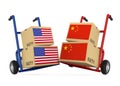 Cardboard Boxes with USA and China Flags with Handtrucks. Trade War Concept