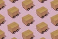 Cardboard boxes on wheels like trucks carry parcels Royalty Free Stock Photo